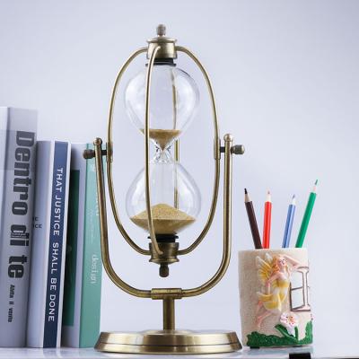 Bronze rotating hourglass